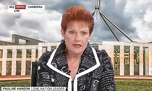 Pauline measures curtains at the Lodge
